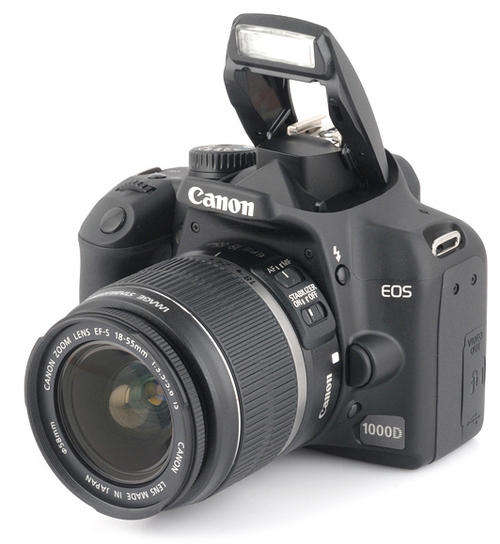 Canon EOS 1000D Digital SLR camera + Canon 18 - 55mm IS Lens  + Memory Card + Bag