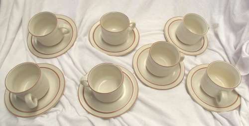 7 DROSTDY STONECRAFT CUPS AND SAUCERS