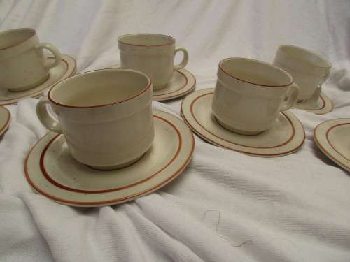 7 DROSTDY STONECRAFT CUPS AND SAUCERS