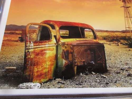 BEAUTIFUL FRAMED PHOTOGRAPH OF A CAR SHELL AND WINDMILL