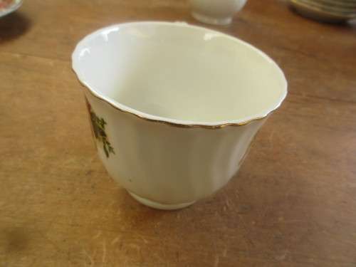 SET OF SEVEN ROYAL CHINA CUPS AND SAUCERS AND A MILK JUG