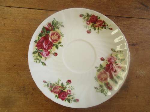 SET OF SEVEN ROYAL CHINA CUPS AND SAUCERS AND A MILK JUG
