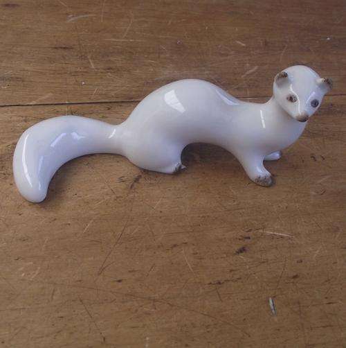 MODEL OF AN ANIMAL POSSIBLY A MARTIN