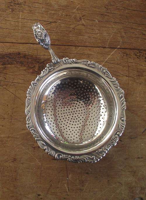 SILVER PLATE TEA STRAINER
