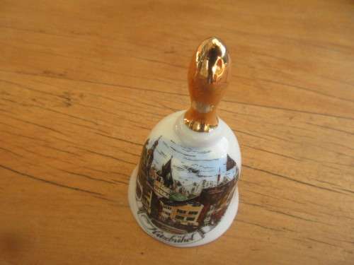 COLLECTION OF FOUR MINIATURE CHINA BELLS ENGLAND