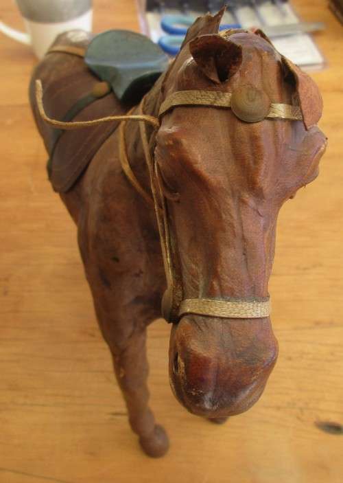 BEAUTIFUL WOOD AND LEATHERETTE COVERED STALLION