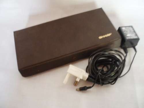 Sharp PC-1211 Programmable Pocket Computer with CE-121 Printer, charger and all Manuals