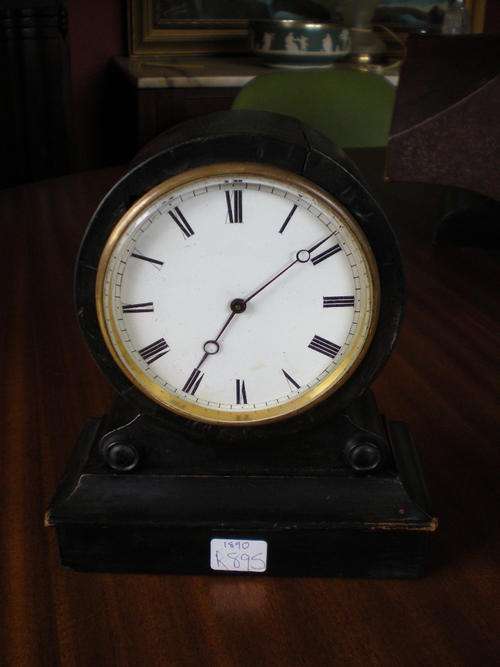 A  LOVELY BLACK WOODEN CLOCK ( CIRCA 1890' s )