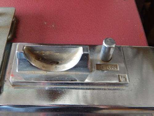 A VINTAGE GOLDEN POKER GAMBLING MACHINE