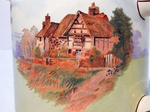 A LARGE ROYAL DOULTON TEA POT ENGLISH COTTAGES