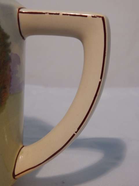 A LARGE ROYAL DOULTON TEA POT ENGLISH COTTAGES