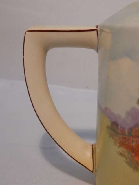 A LARGE ROYAL DOULTON TEA POT ENGLISH COTTAGES