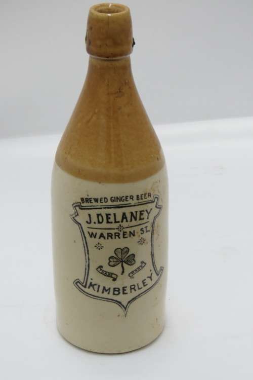 A VINTAGE COLLECTIBLE GINGER BEER BOTTLE J. DELANEY