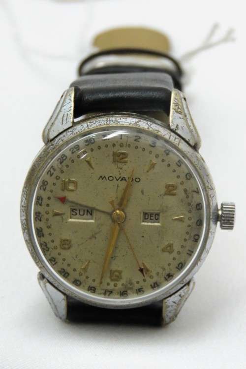 A RARE MOVADO "TRIPLE CALENDAR WATCH "  MANUAL WIND