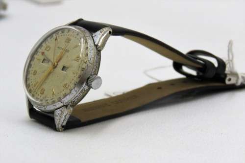 A RARE MOVADO "TRIPLE CALENDAR WATCH "  MANUAL WIND