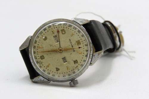 A RARE MOVADO "TRIPLE CALENDAR WATCH "  MANUAL WIND