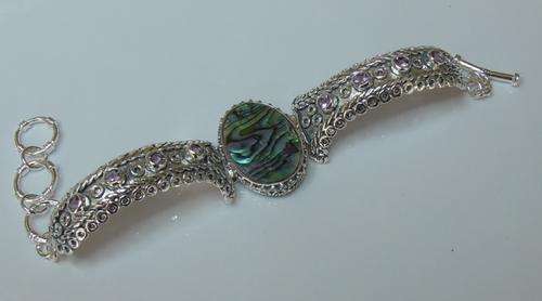 Sterling silver plated bracelet with paua shell centre piece