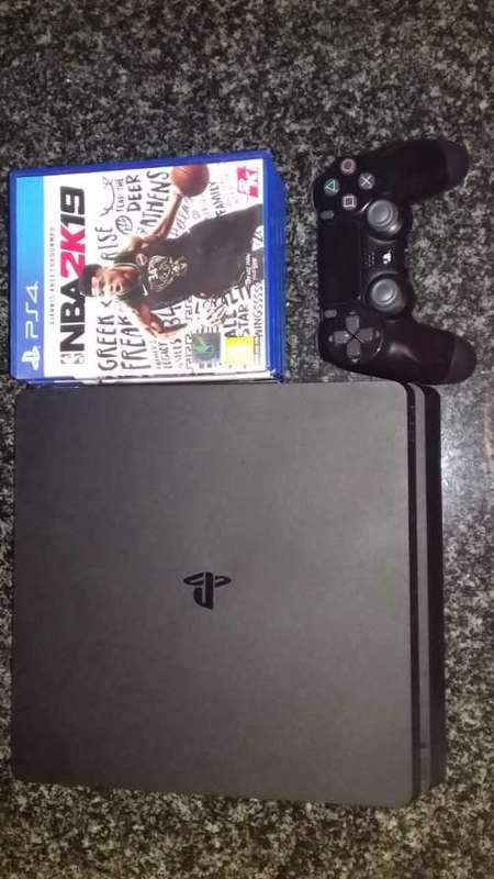 PS4 Slim Console with five games