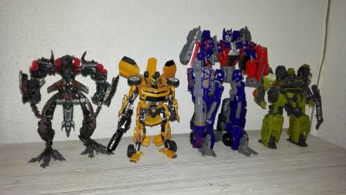 4 Large Transformers figurines
