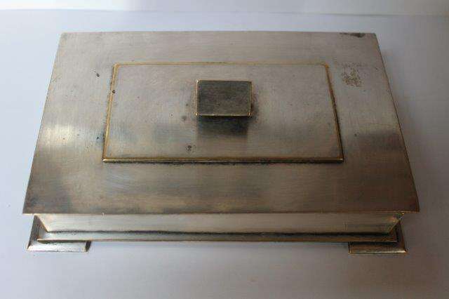 Old silver metal cigar box with wood lining