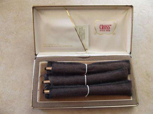 A Three Piece 14 Karat Gold Filled Cross Pen Set