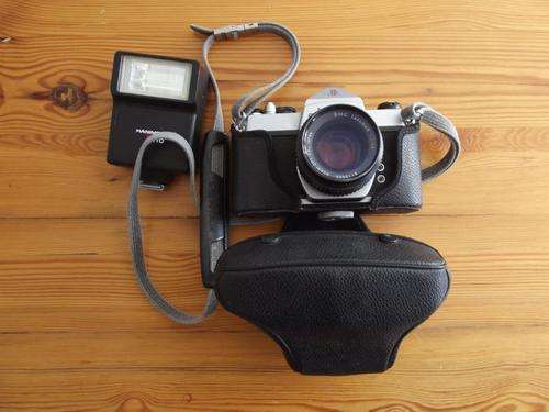 An Old Pentax Camera in Case with Flash