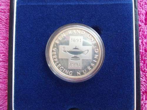 A 1991 Proof Silver Protea One Rand Coin - Nursing- SAM