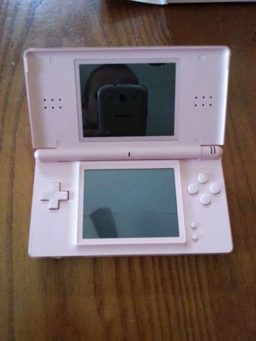 Nintendo DS (pink in colour)