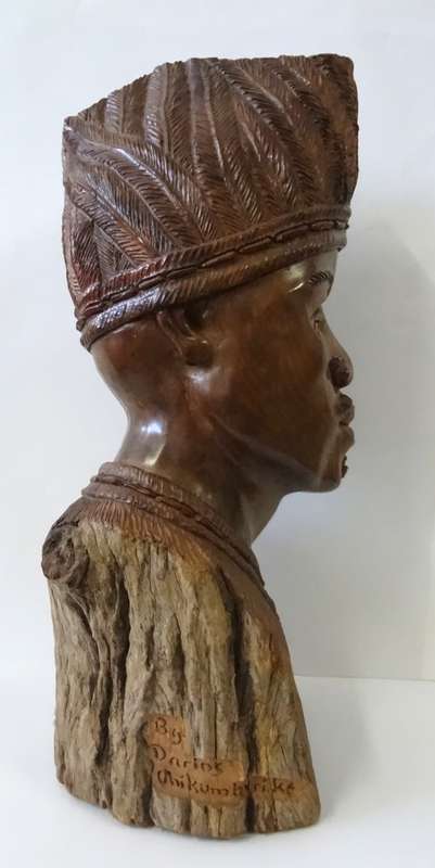 darios chikumbirike wood sculpture