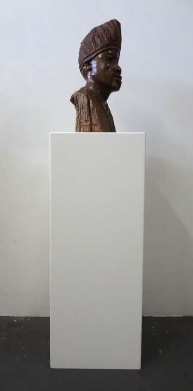 darios chikumbirike wood sculpture