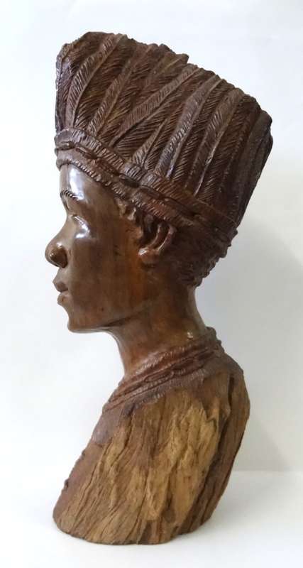 darios chikumbirike wood sculpture