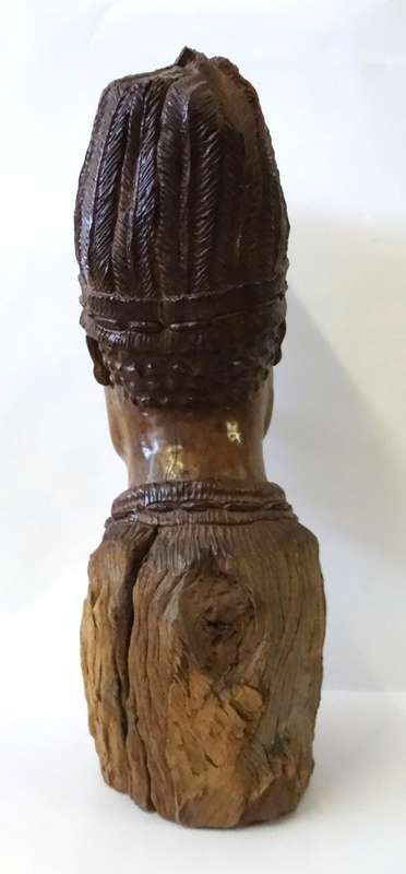 darios chikumbirike wood sculpture