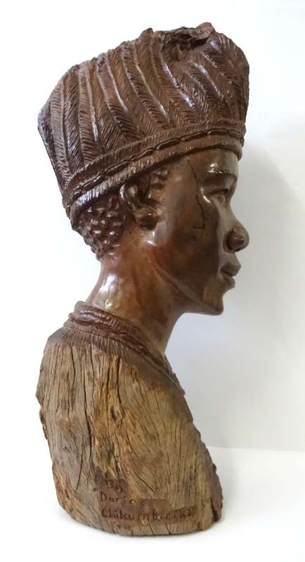 darios chikumbirike wood sculpture