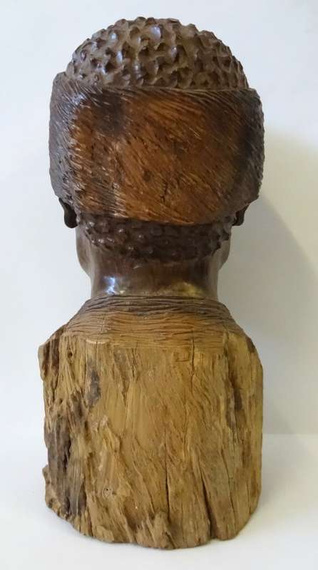darios chikumbirike wood sculpture