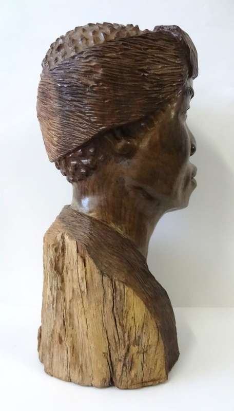 darios chikumbirike wood sculpture