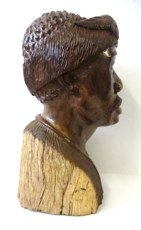 darios chikumbirike wood  sculpture
