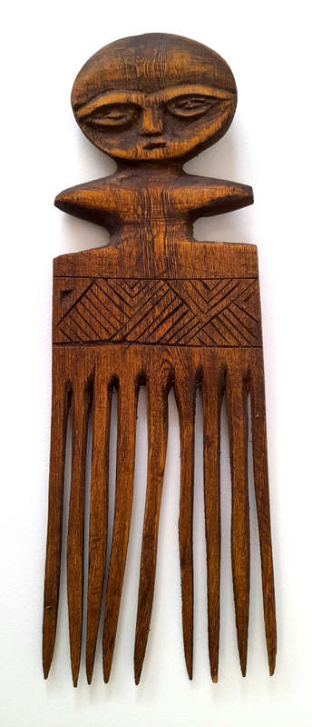 robson shamuyarira - afro combs wood sculpture