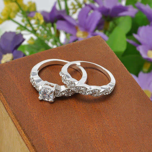 STUNNING NATURAL WHITE SAPPHIRE IN 6X STERLING SILVER OVERLAY. SIZE 6