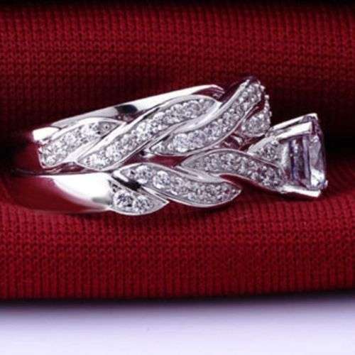 STUNNING NATURAL WHITE SAPPHIRE IN 6X STERLING SILVER OVERLAY. SIZE 6