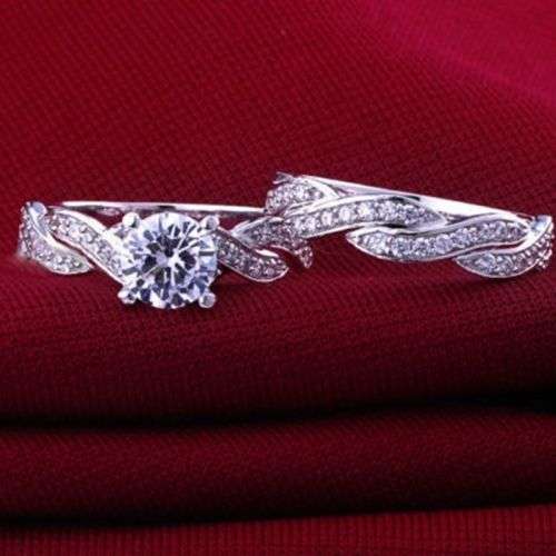 STUNNING NATURAL WHITE SAPPHIRE IN 6X STERLING SILVER OVERLAY. SIZE 6