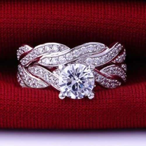 STUNNING NATURAL WHITE SAPPHIRE IN 6X STERLING SILVER OVERLAY. SIZE 6