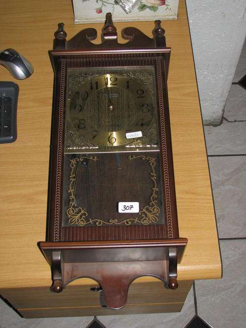 Rhythm Wall Clock