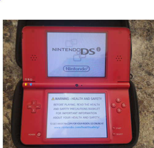 Nintendo DSi XL Mario Edition with 4 Games + Free Courier Delivery