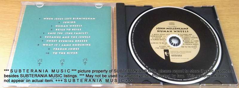 JOHN MELLENCAMP Human Wheels  [Shelf G Box 8 + main stock room]