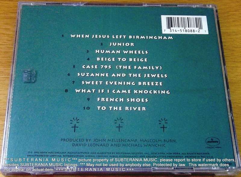 JOHN MELLENCAMP Human Wheels  [Shelf G Box 8 + main stock room]