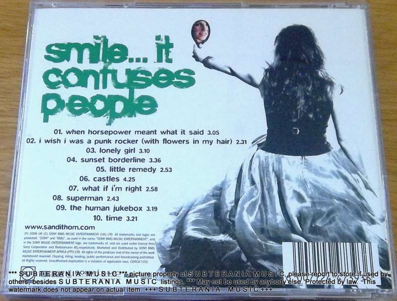 SANDI THOM Smile ... It Confuses People  [Shelf G Box 15]