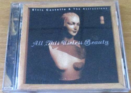 ELVIS COSTELLO + THE ATTRACTIONS  All This Useless Beauty  [Shelf G Box 4]