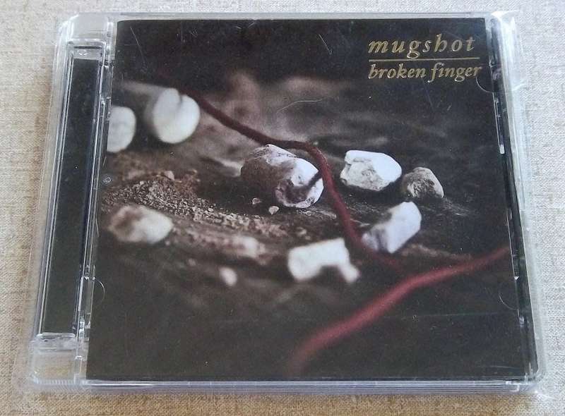 MUGSHOT Broken Finger SOUTH AFRICA Cat# MLG002