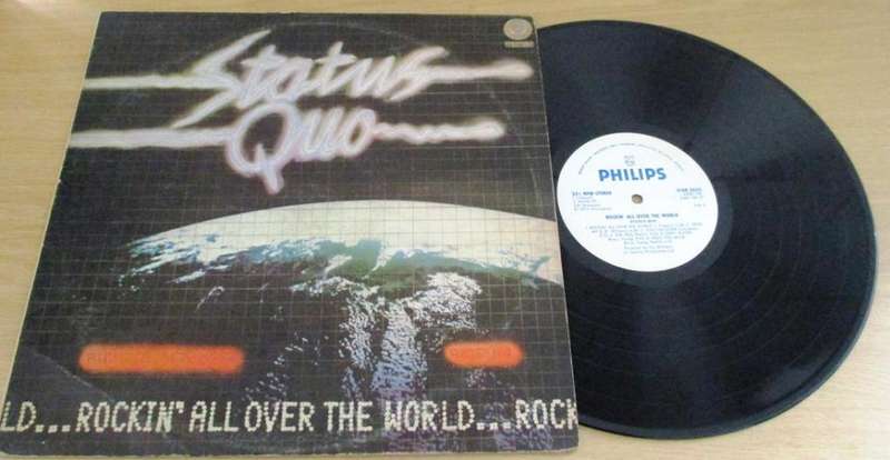 STATUS QUO  Rockin` All Over The World Rhodesian LP VINYL RECORD [Shelf G]
