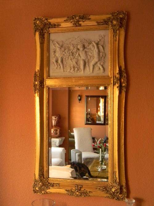 A one of a kind Exquisite Ornate Beveled Mirror with Cast Cherubs for POPPETJIE ONLY